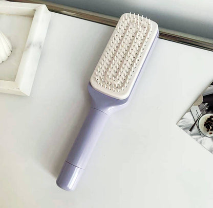Brosse à cheveux autonettoyante