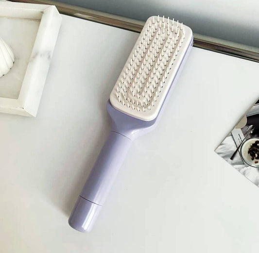 Brosse à cheveux autonettoyante