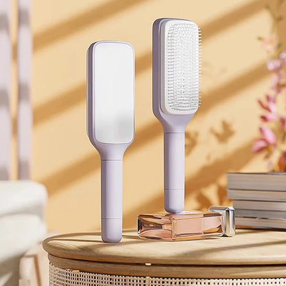 Brosse à cheveux autonettoyante